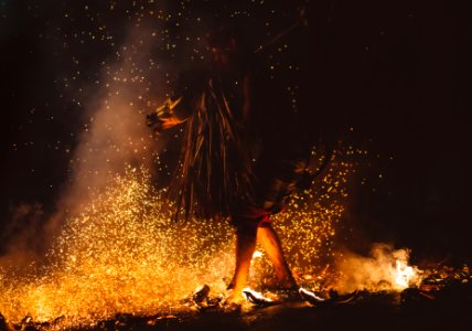 person walking of fire photo