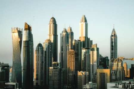city buildings under sunny sky photo