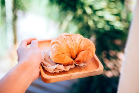 croissant on wooden plate photo