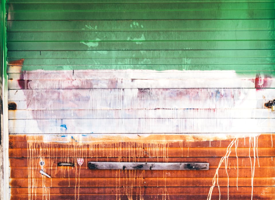 wooden wall with brown and green paint
