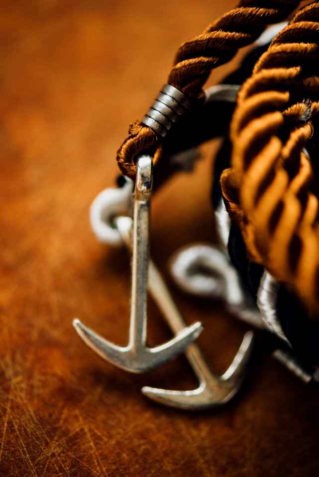 silver-colored anchor accessory