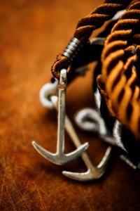 silver-colored anchor accessory photo