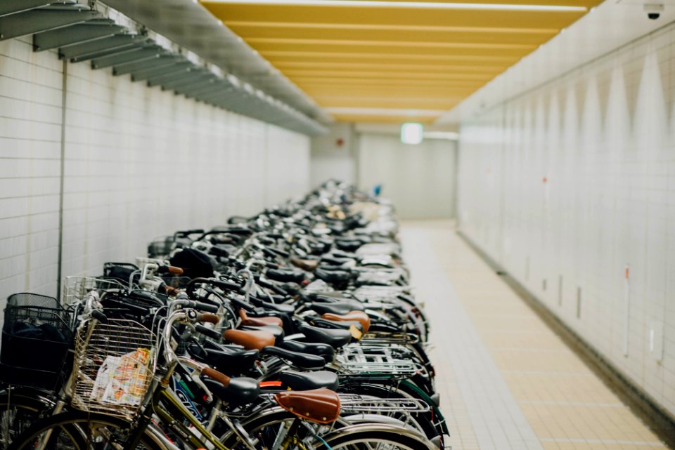 assorted bicycle lot inside building photo