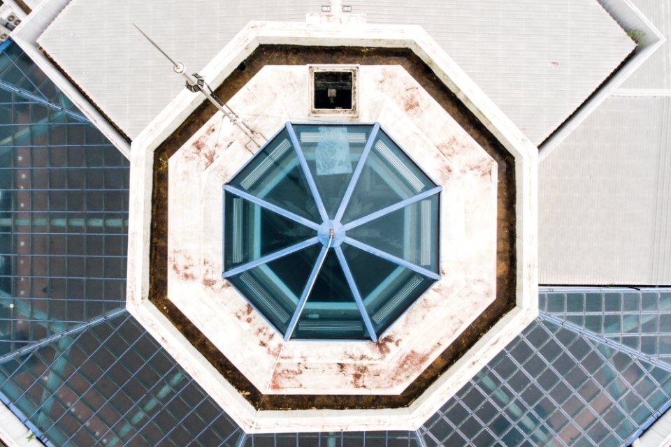 low-angle photography of white and black building photo