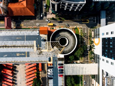aerial photography of round gray concrete building at daytime photo