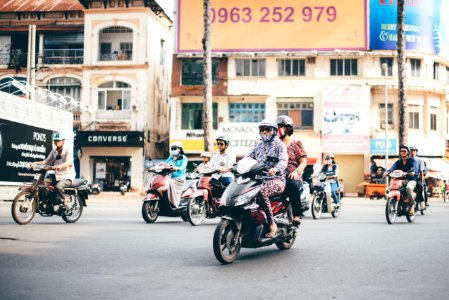 people riding motorcycles during daytime photo
