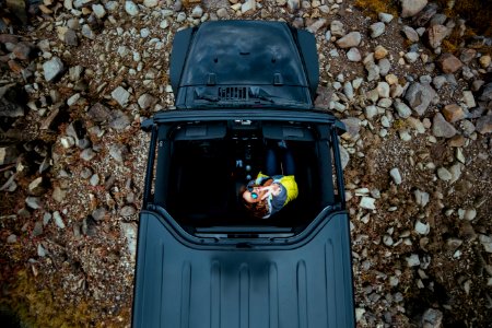 bird's eye view of person riding black top-down vehicle photo