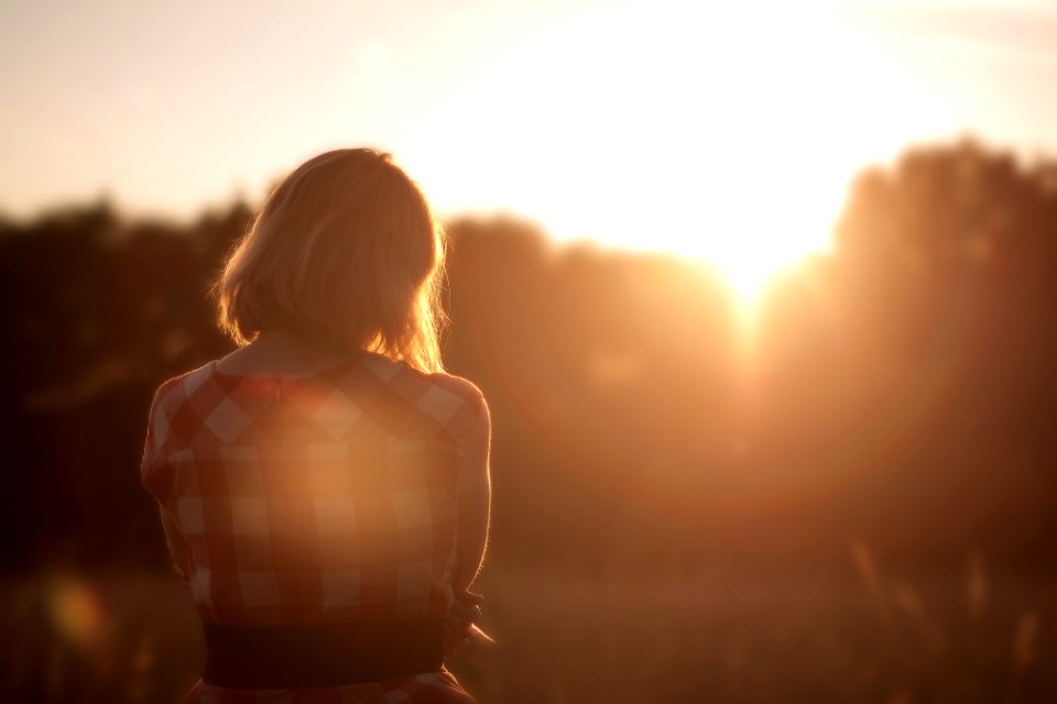 woman looking at trees photo