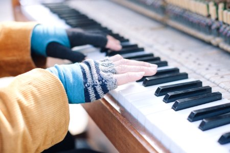 person playing piano photo
