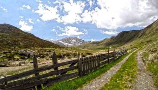 brown wooden fence on mountain photo
