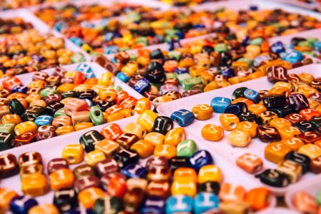 assorted-color bead lot on white tray photo