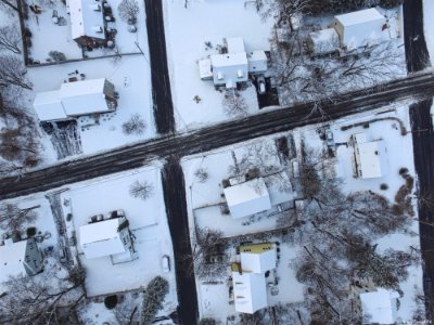 top view photography of house covered with snow photo
