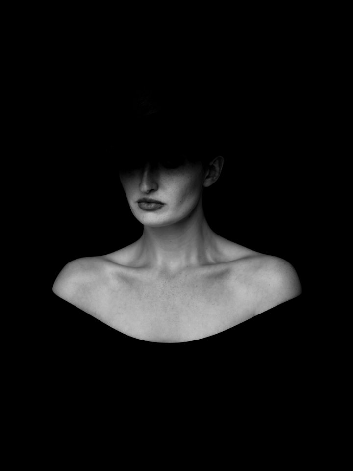 woman in black hat
