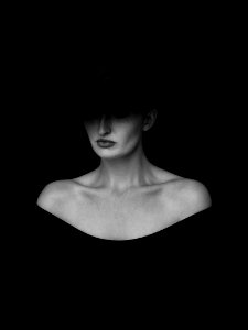 woman in black hat