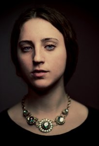 portrait photography of woman in black top photo