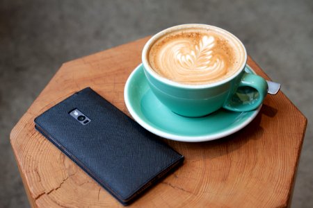 coffee latte serve in ceramic cup