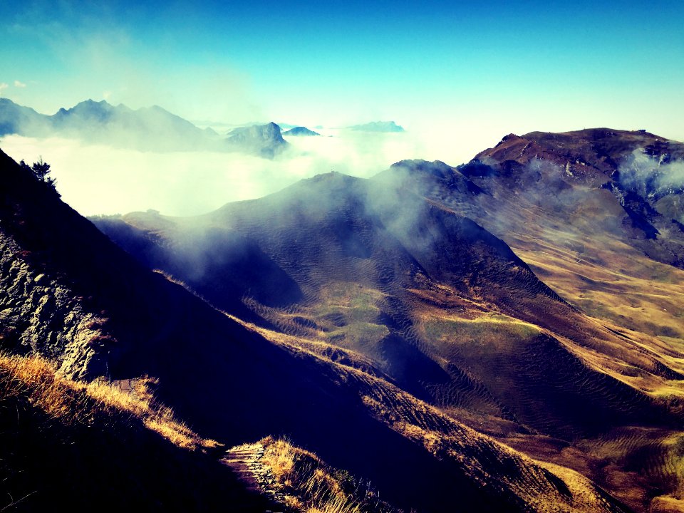 view of mountains and clouds