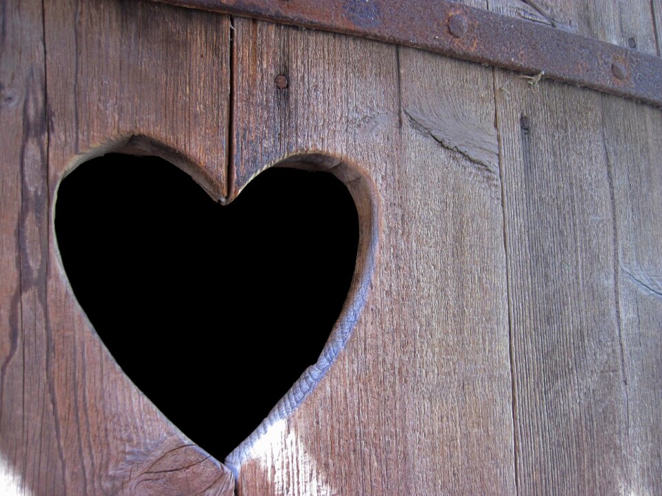 Wooden structure heart in the wood board