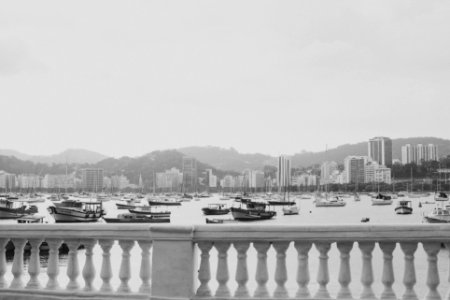 grayscale photo of boats on body of water photo