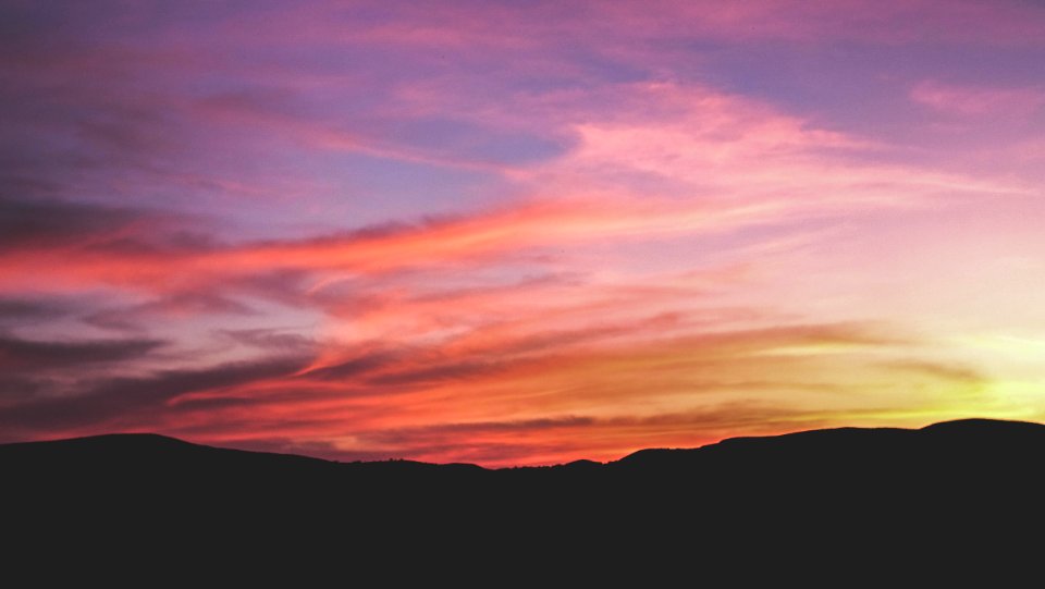 mountain silhouette during sunset photo