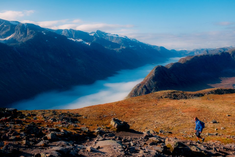 person walking on mountain
