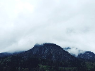photo of clouds covering mountain