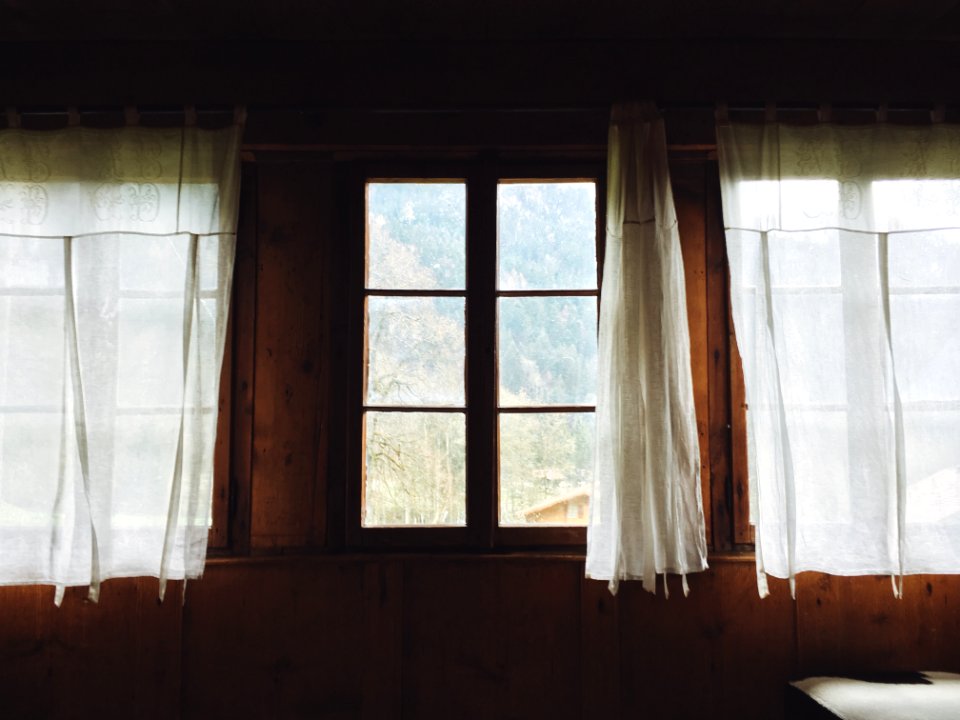 clear glass window with cutrain