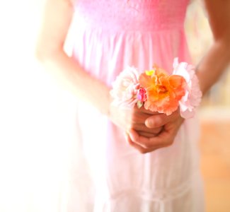 girl holding flowers