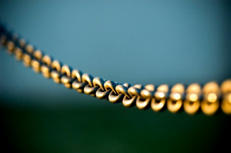tilt shift photography of gray steel chains photo