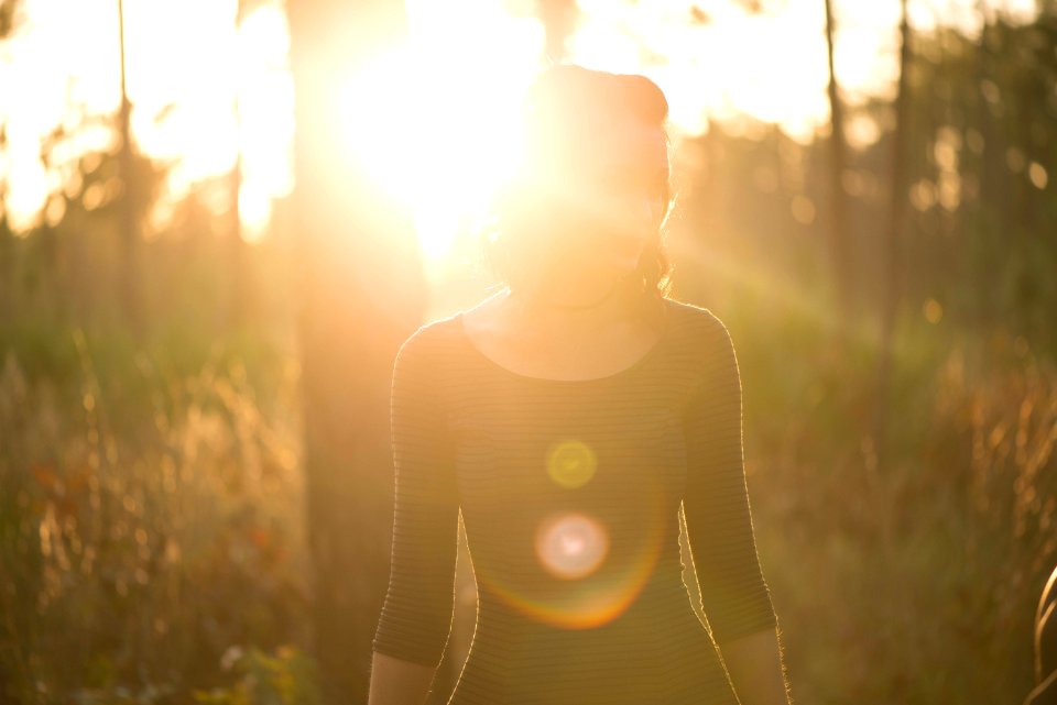 woman standing grass field