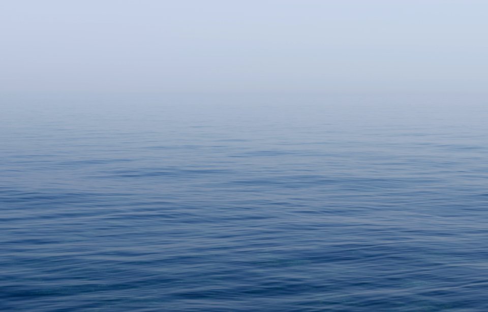 misty body of water
