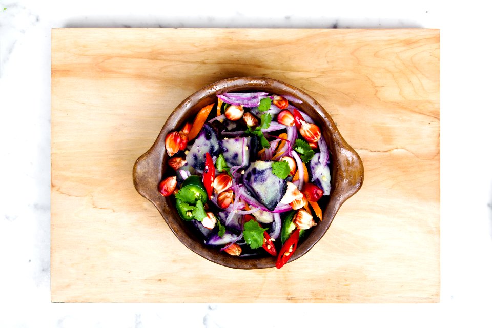 sliced onions and bell pepper in a bowl photo