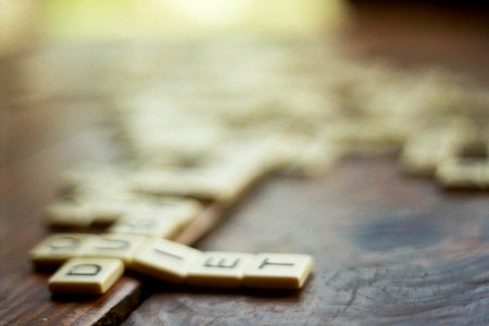 shallow focus photography of scrabble pieces photo
