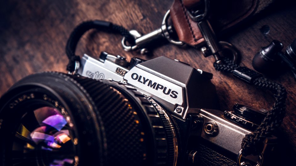 shallow focus photo of Olympus camera