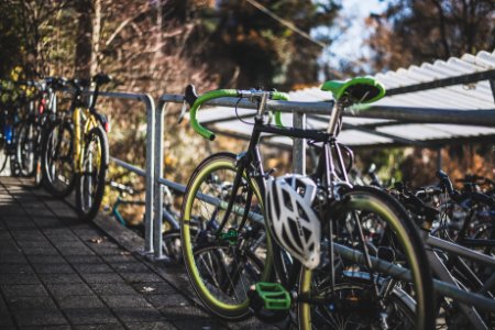 green and black road bike photo