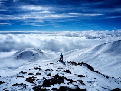 person on snow covered mountain