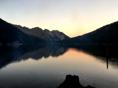 mountain across lake under blue sky