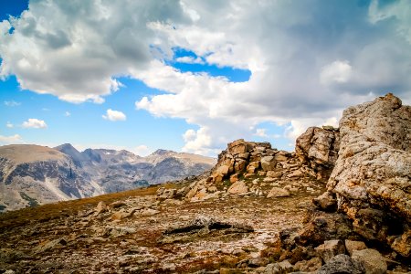 beige rock formation on mountain photo