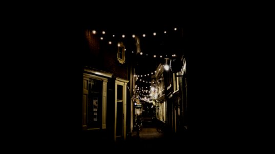 string bulbs on street by night