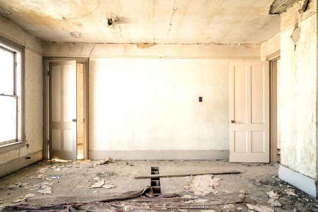 gray concrete walls with broken floor photo