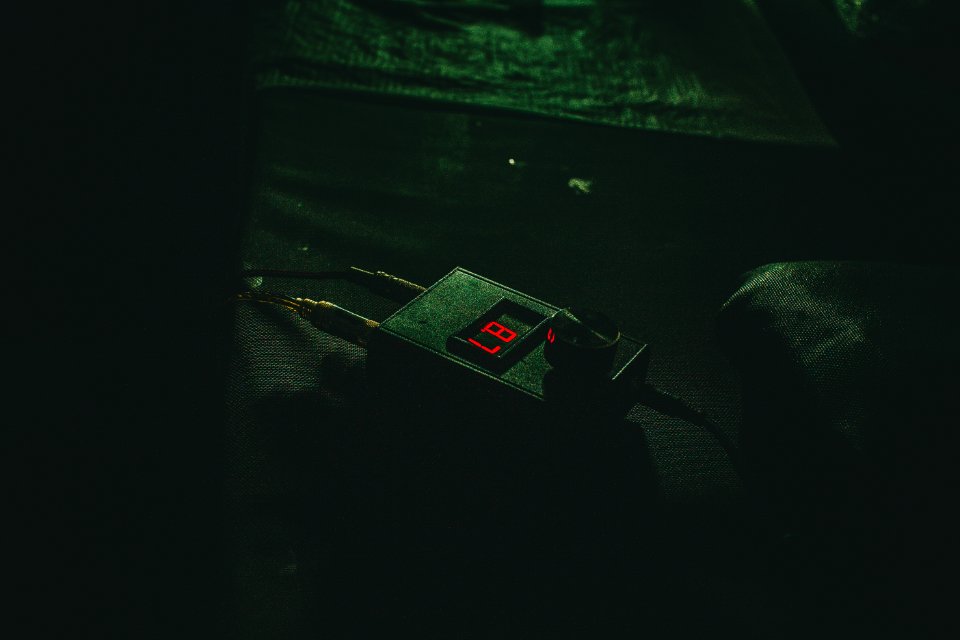 black digital device with the number 87