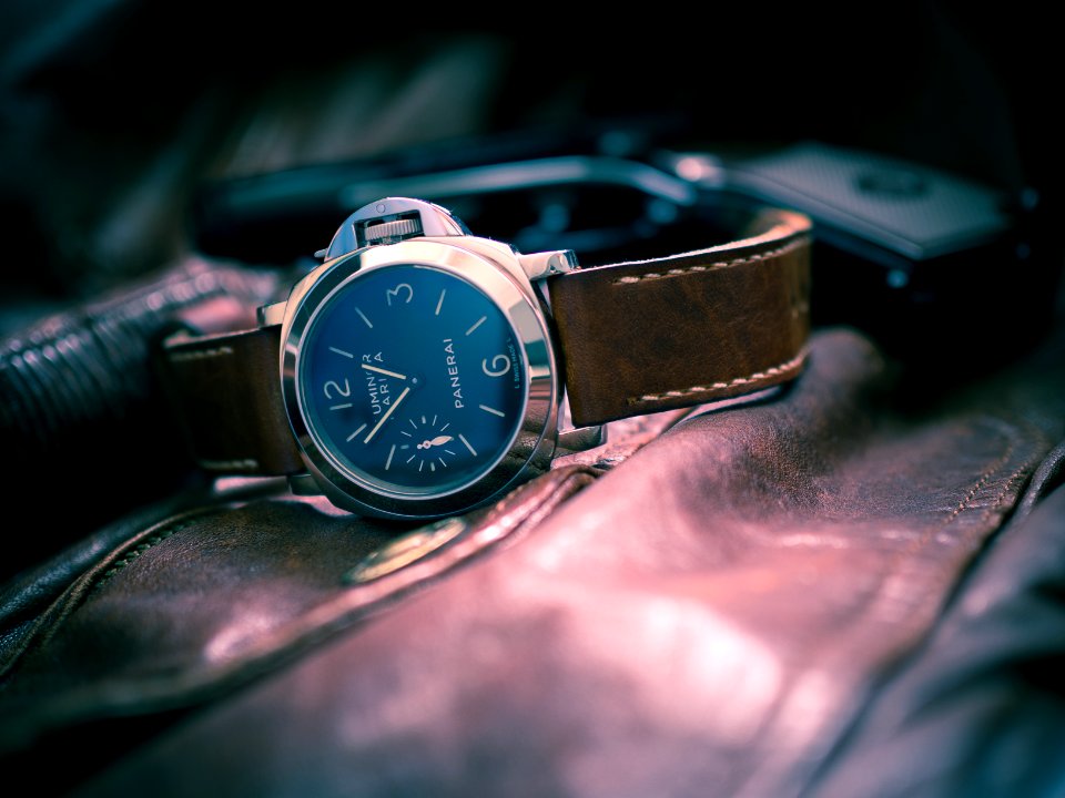 selective-focus photography of black chronograph watch
