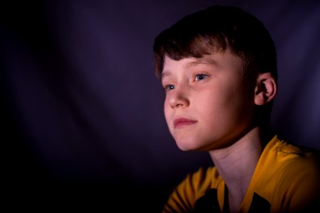 boy in yellow shirt