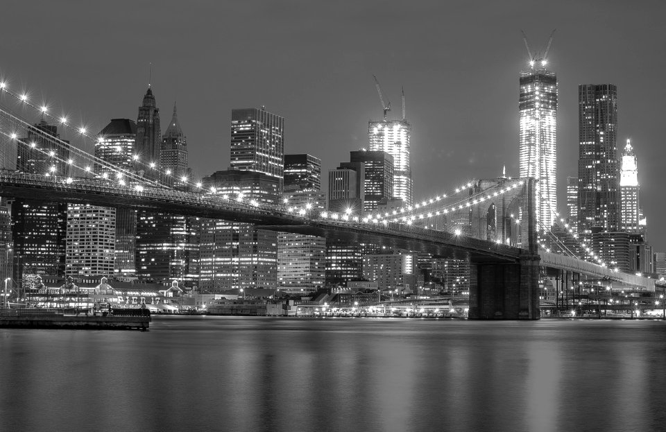 grayscale photo of lighted Brooklyn Bridge photo
