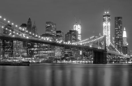 grayscale photo of lighted Brooklyn Bridge photo