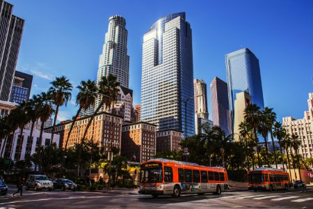 bus on road near building at daytime photo