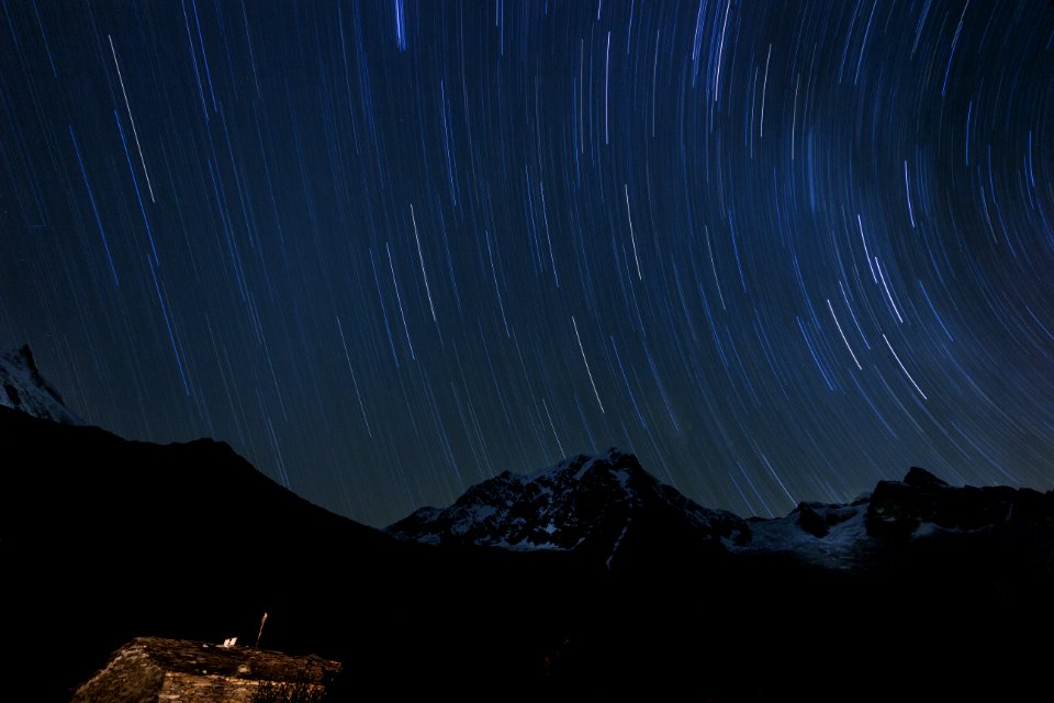 mountains under starry night
