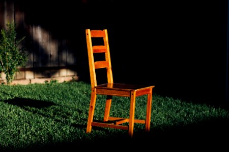 chair on grassland photo