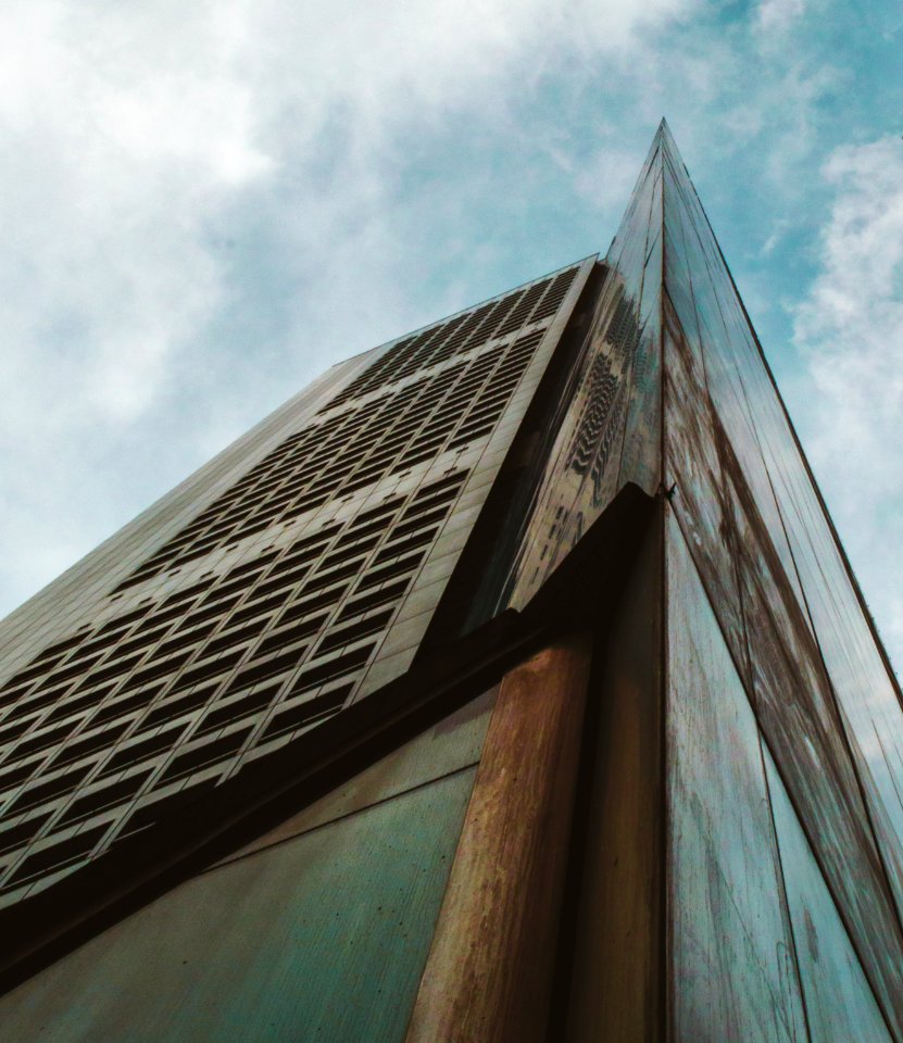 low-angle photo of high-rise building during daytime
