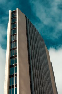 low angle photography of multi-story high rise building during daytime photo